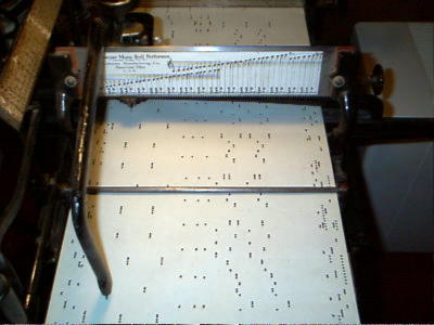 The #8-B perforator is creating a NEW Ampico roll, for 2001!